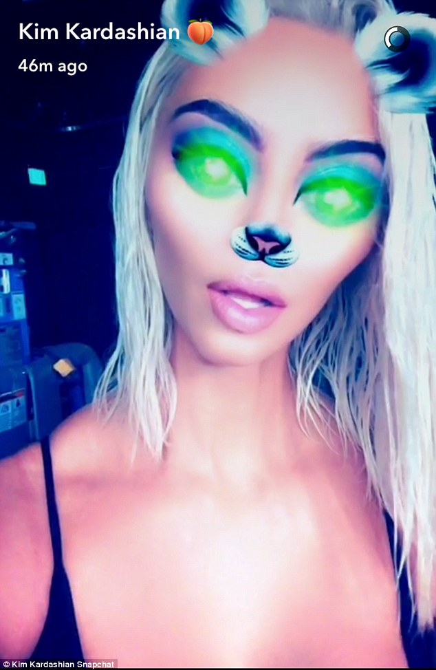 Kim Kardashian appears to have platinum locks again as she wishes Paris Hilton a Happy Birthday on Snapchat