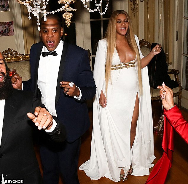 Pregnant Beyonce dances up a storm at exclusive post-Grammy bash in low-cut white gown