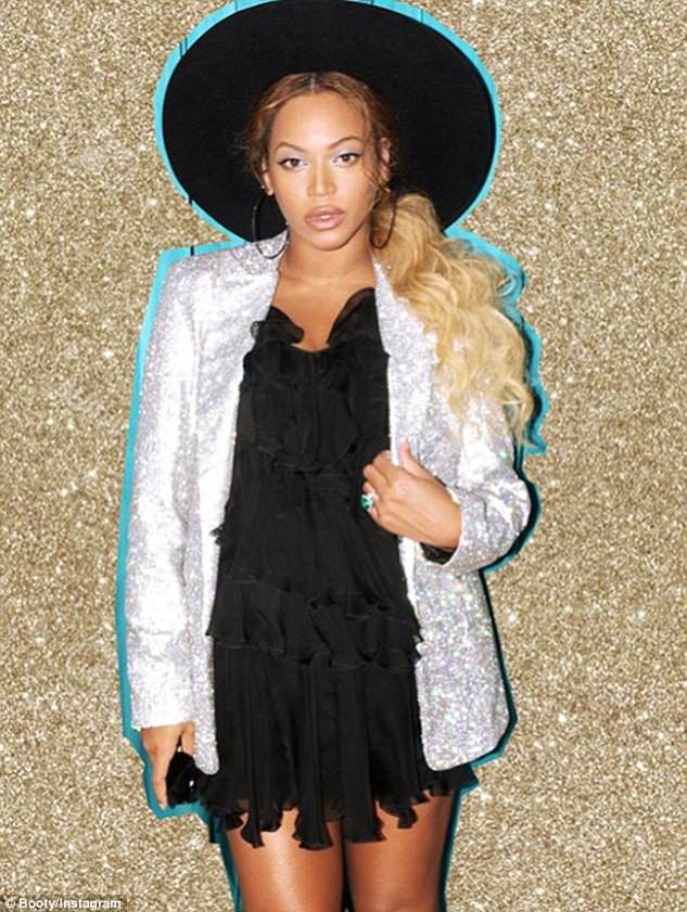 Pregnant Beyonce puts her baby belly on display in Thigh-skimming Mini-Dress