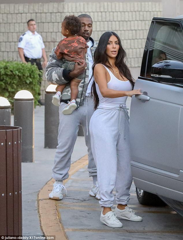 Braless Kim Kardashian sports the SAME casual tank top and posterior-flaunting sweatpants for three days straight