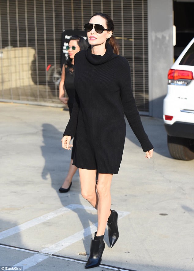 Angelina Jolie vamps it up in leggy black mini dress at Deadline Contenders event