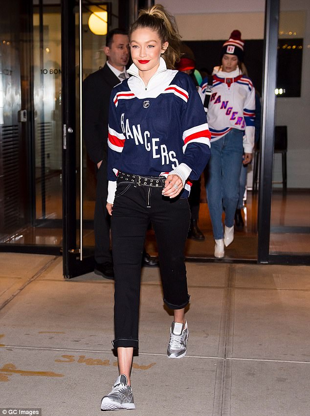 Gigi and Bella Hadid sport matching NY Rangers jerseys on their way to hockey game at Madison Square Garden