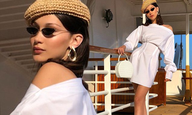 Bella Hadid highlights her waist and toned legs in White Mini Dress