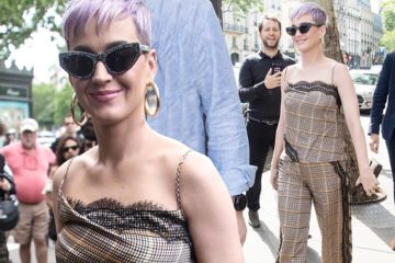 Katy Perry oozes Parisian chic in a stylish jumpsuit and cat-eye shades in the French capital