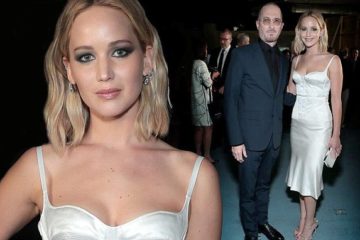 Jennifer Lawrence smolders in white silk while crossing paths with ex Darren Aronofsky at BAM