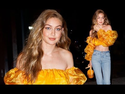 Gigi Hadid flaunts her toned tummy in off the shoulder orange crop top as she steps out in NYC