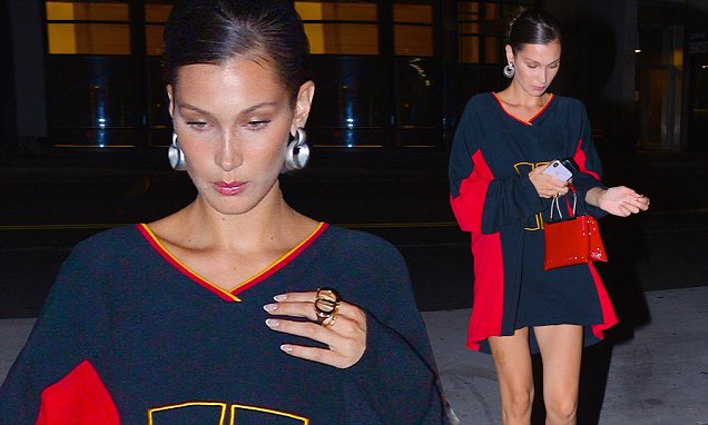 Bella Hadid shows off her legs in a tiny black and red shirt dress as she steps out in New York