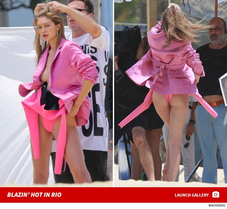 Gigi Hadid goes Braless in Super Revealing Hot Pink Blazer