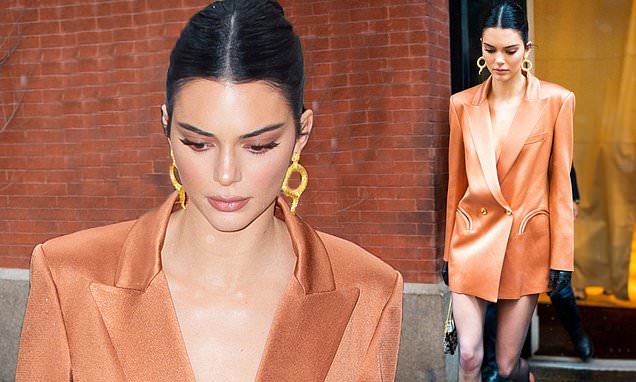 Kendall Jenner puts her long legs on parade in Satin Blazer Dress for Stuart Weitzman Event