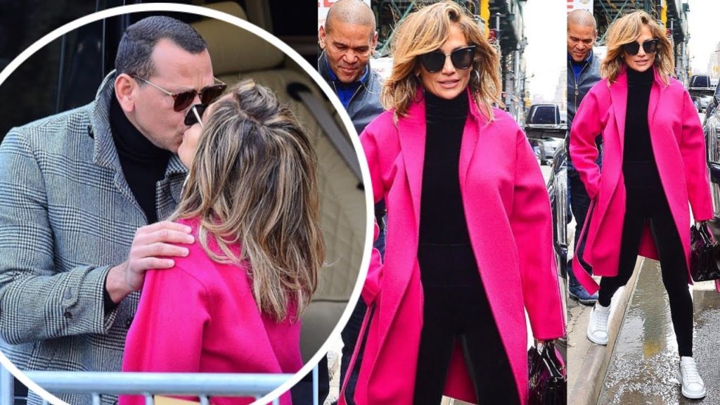 Jennifer Lopez in a hot pink coat as kiss with new fiance Alex Rodriguez in NYC